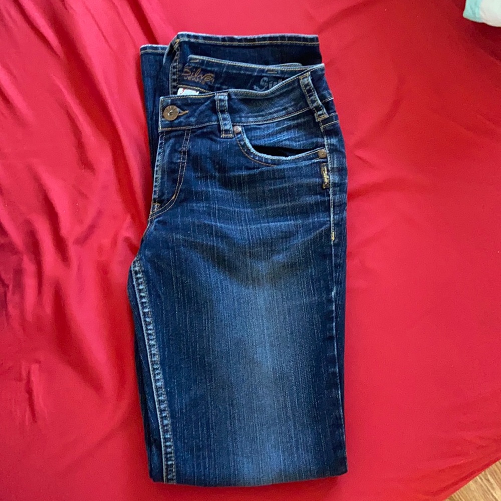 Silver blue jeans.